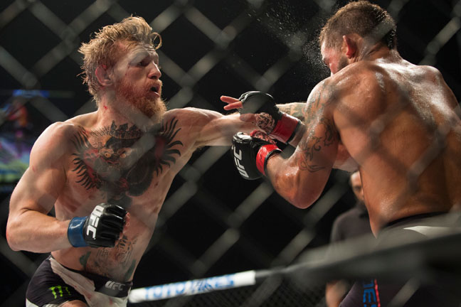 Monster Energy's Conor McGregor Wins UFC 189 Against Chad Medes Taking the Interim Featherweight Title