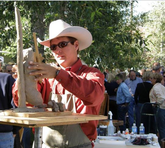 A QuickDraw artist sculpts in the open air at one of the Jackson Hole Fall Arts Festival’s most popular events (photo by Jackson Hole Chamber of Commerce).