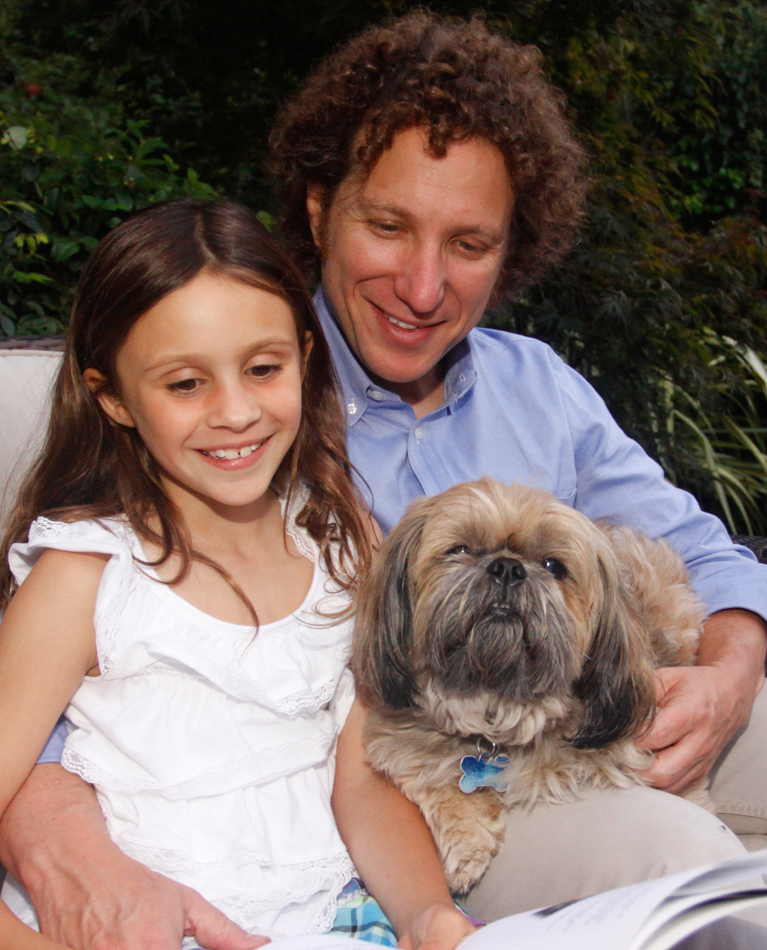 Dr. Richter and his daughter Abbey reading