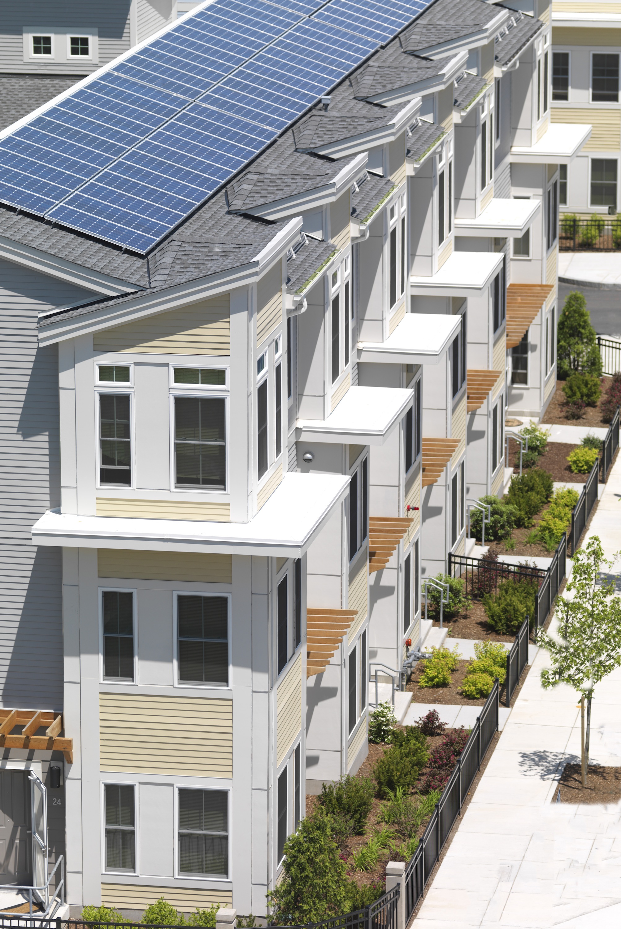 Rooftop solar panels are just one of the sustainability strategies employed by the project team for Homes at Old Colony
