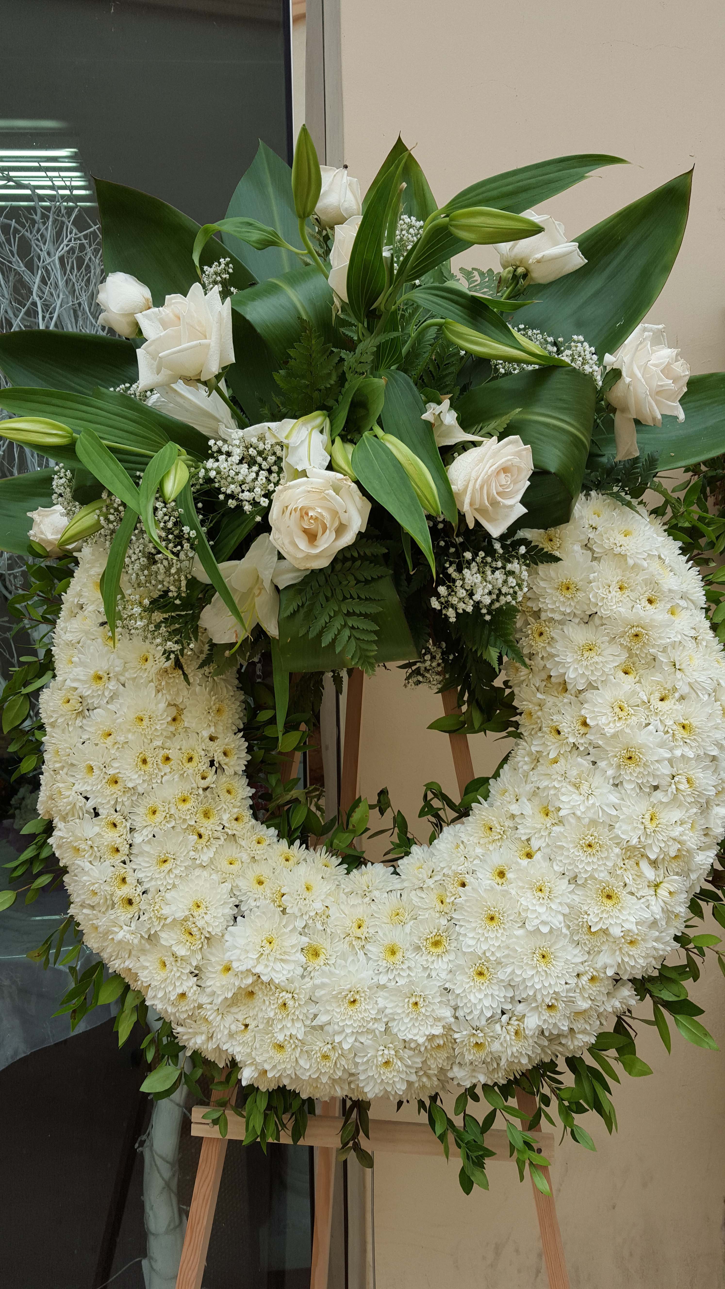 A circular funeral wreath is a symbol of eternity