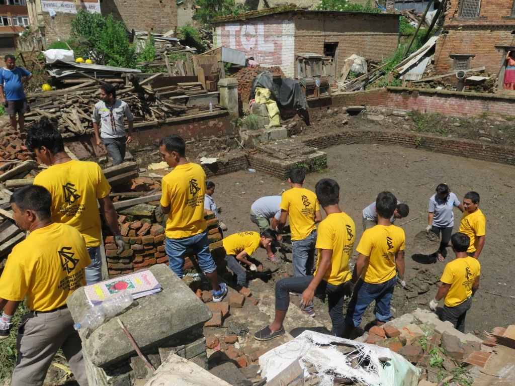 Volunteer Ministers help dredge the sacred pond in Sankhu. It was filled with debris by the April 2015 Nepal earthquake.