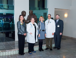 Check presentation by The One-In-Six Foundation to Akron General McDowell Cancer Institute