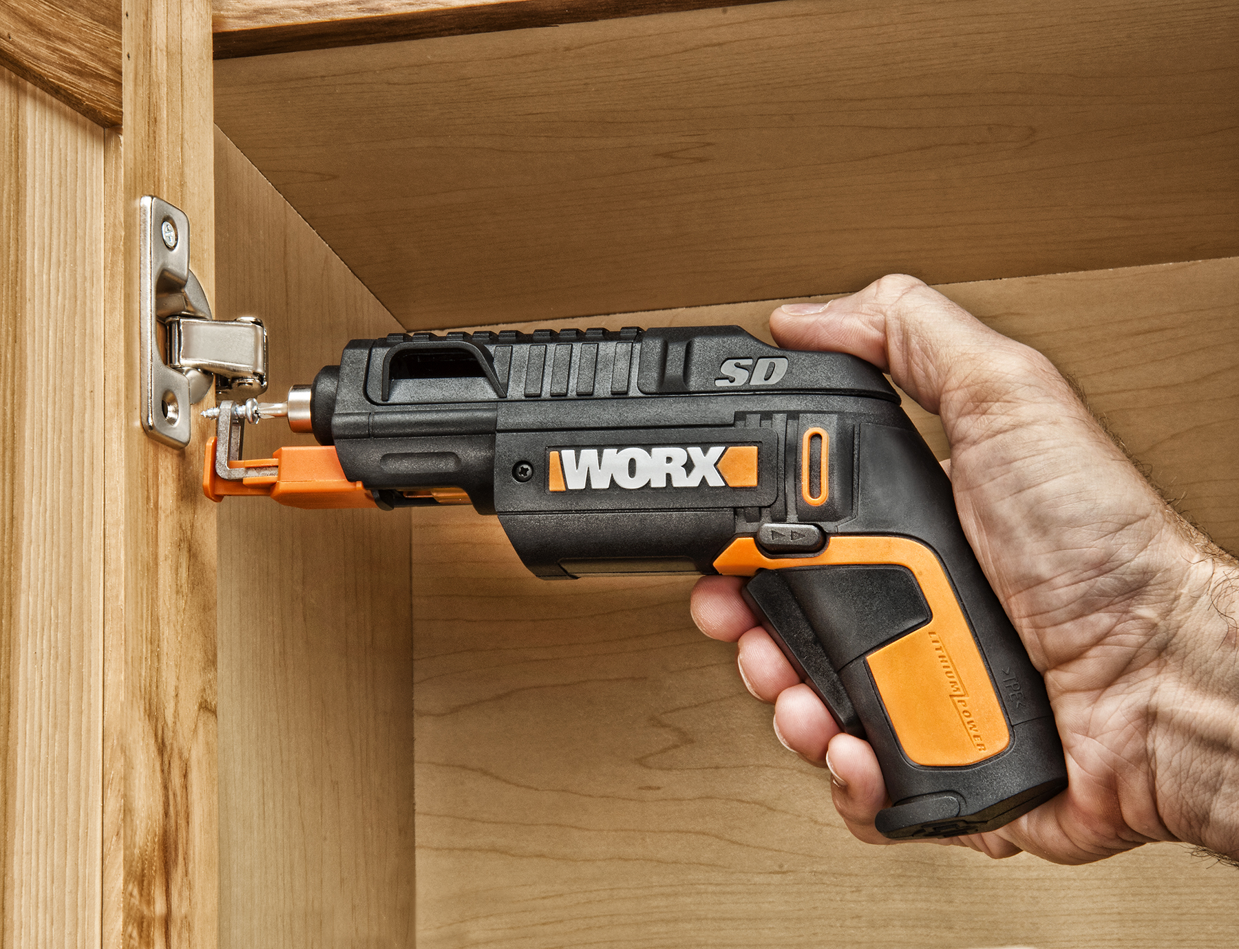 WORX SD SemiAutomatic Driver with Screw Holder helps fasten hinge.