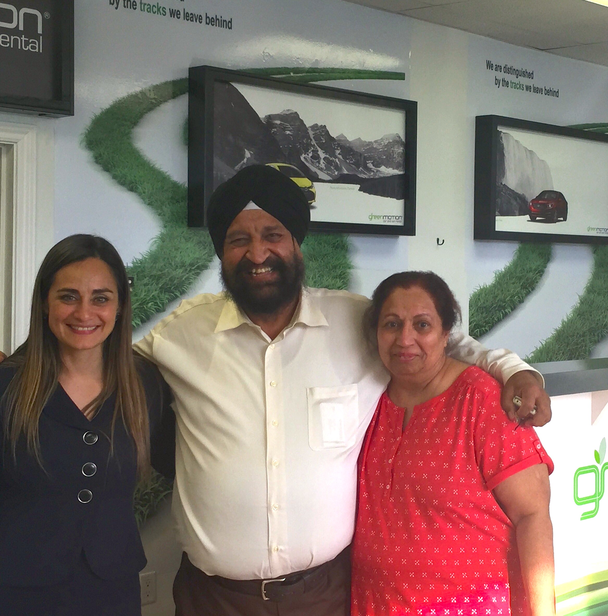 Green Motion Car Rental Toronto, Canada owners Tejpal and Narinder Sahni with Green Motion Franchise Development Director Brenda Azua