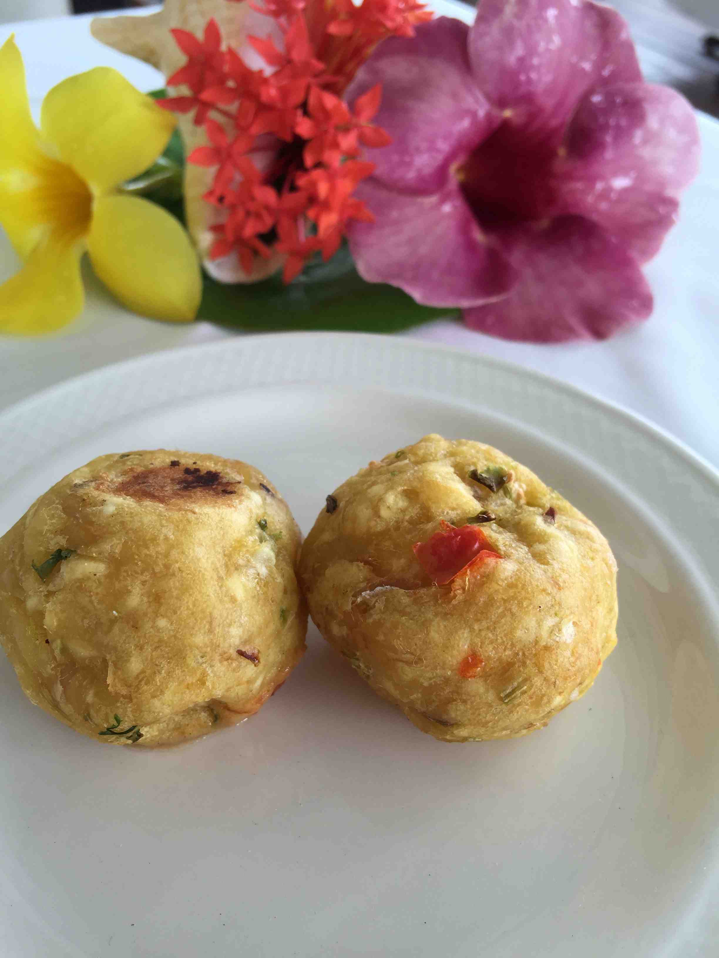 Baked breadfruit balls are offered at Calabash Cove Resort & Spa in St. Lucia.