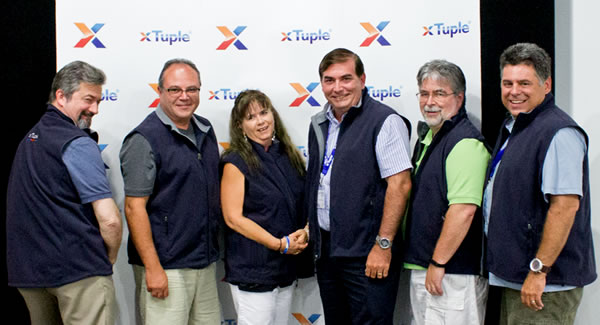Modeling their new xTuple ERP logo wear, xTuple's 2015 Elite Partners pictured (left to right): Bralick, Kleyff, Knight, Martinez, McIntosh, Zuke. Not pictured, Anil Cherian.