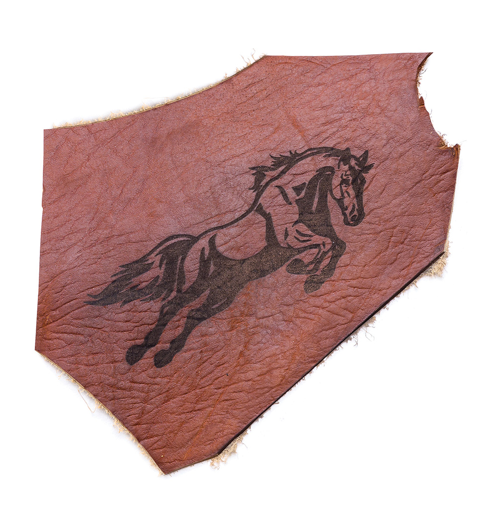 The Full Spectrum Laser can mark an image on leather.
