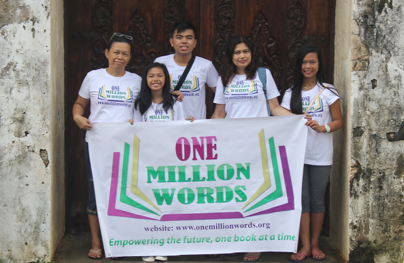 Members of the One Million Words team preparing to help children with the Laos donation