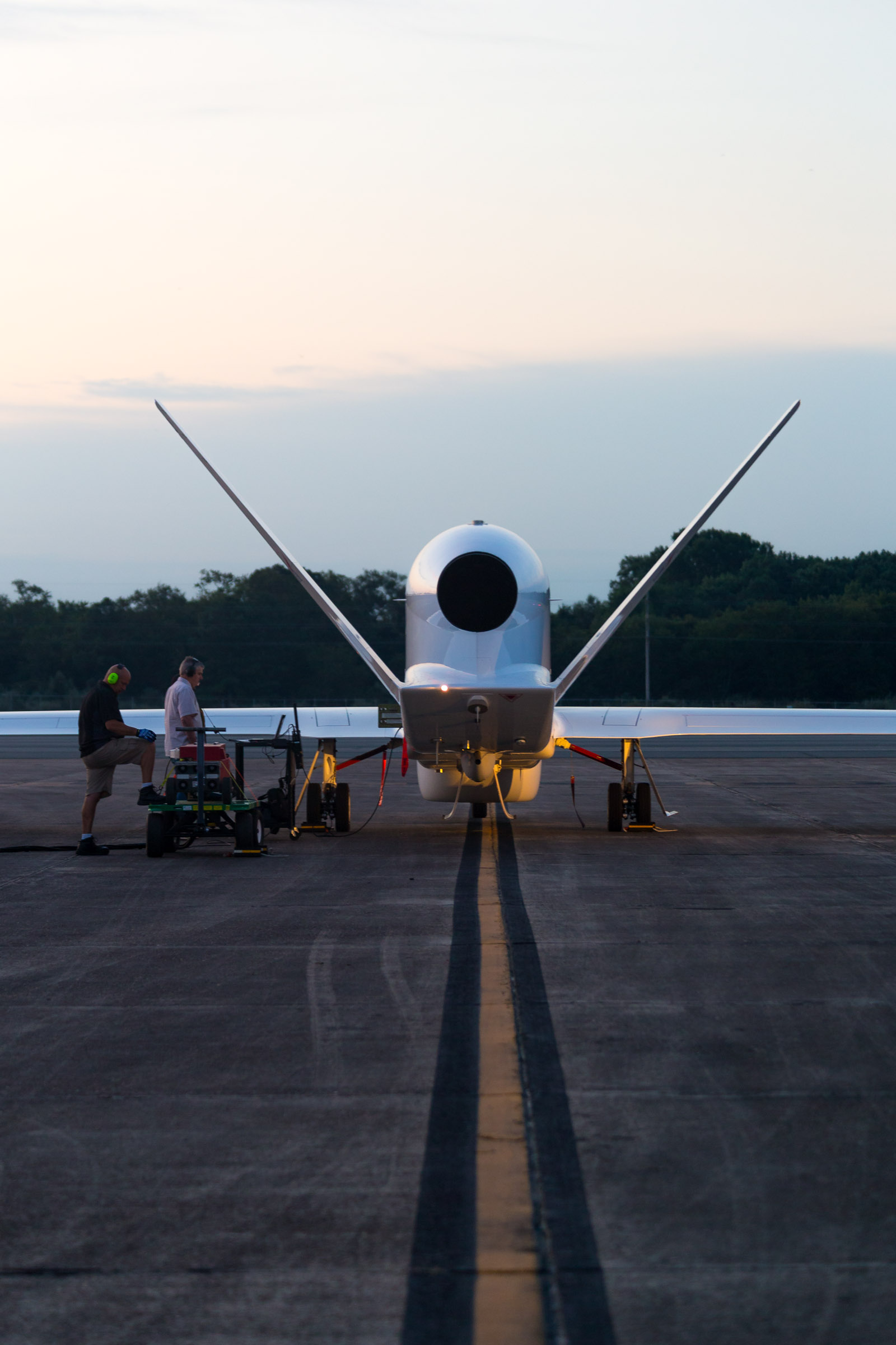 Ground crews prepare NASA’s Global Hawk for the 2015 inaugural flight over Tropical Storm Erika as part of the NOAA-led mission Sensing Hazards with Operational Unmanned Technology (SHOUT). Photo cred