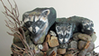 Connecticut Senior Juried Art Show: Honorable Mention in Sculpture Category – Vivian Newill, age 86, of Cheshire, CT – Raccoons (Rocks, Paint, Glue, Natural Materials)