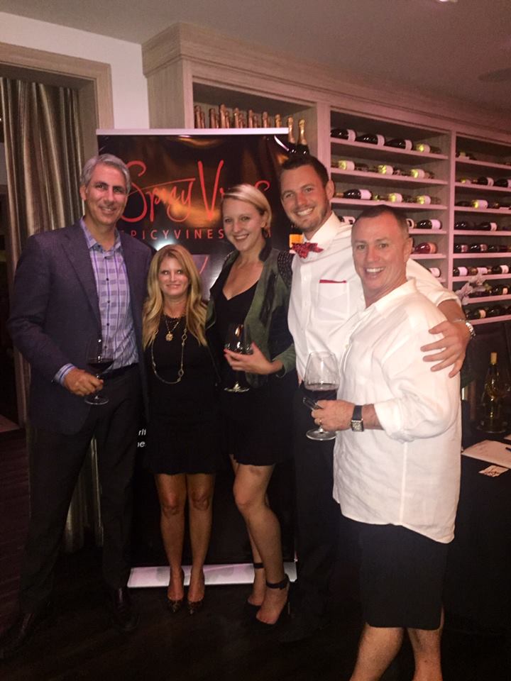 Spicy Vines wine tasting at Hanna's Restaurant. Toni Andrews Managing Partner Spicy Vines, Crystalyn Hoffman President Spicy Vines, Zack Miskel Co-founder of Spicy Vines and Ronnie Andrews of Vinome