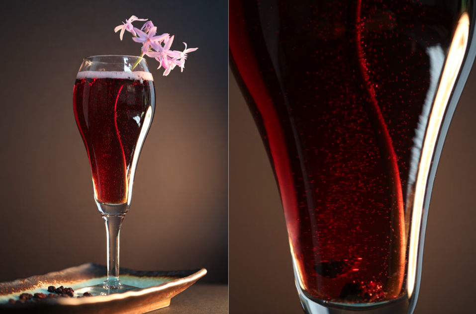 Spritzer with Spicy Vines Original Spiced Blend mixed with sparkling wine and raspberry. A perfect alternative to wine and great for the upcoming holidays.