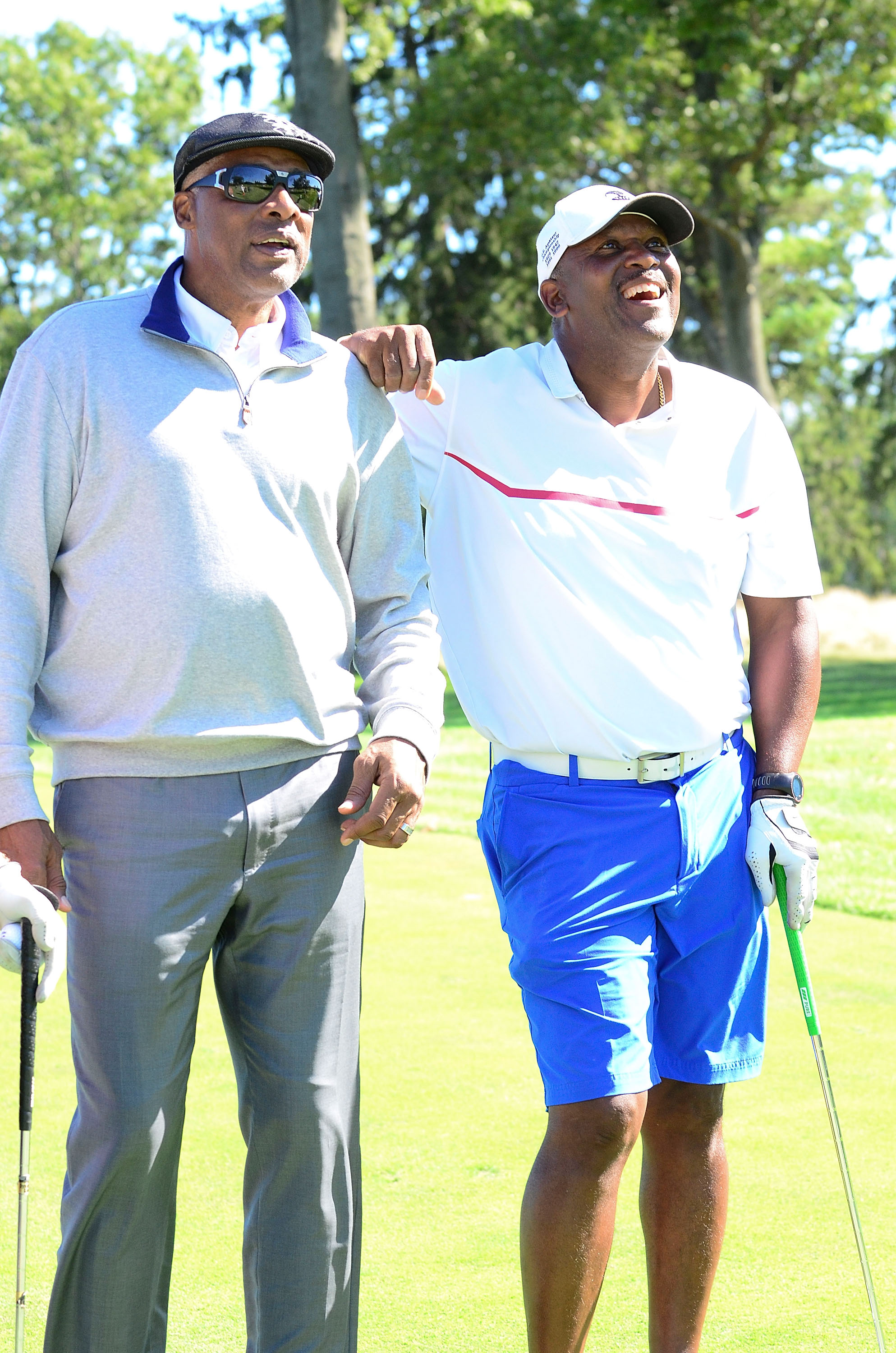 Julius Erving & Joe Carter hang at the Julius Erving Golf Classic at Aronimink Golf Club