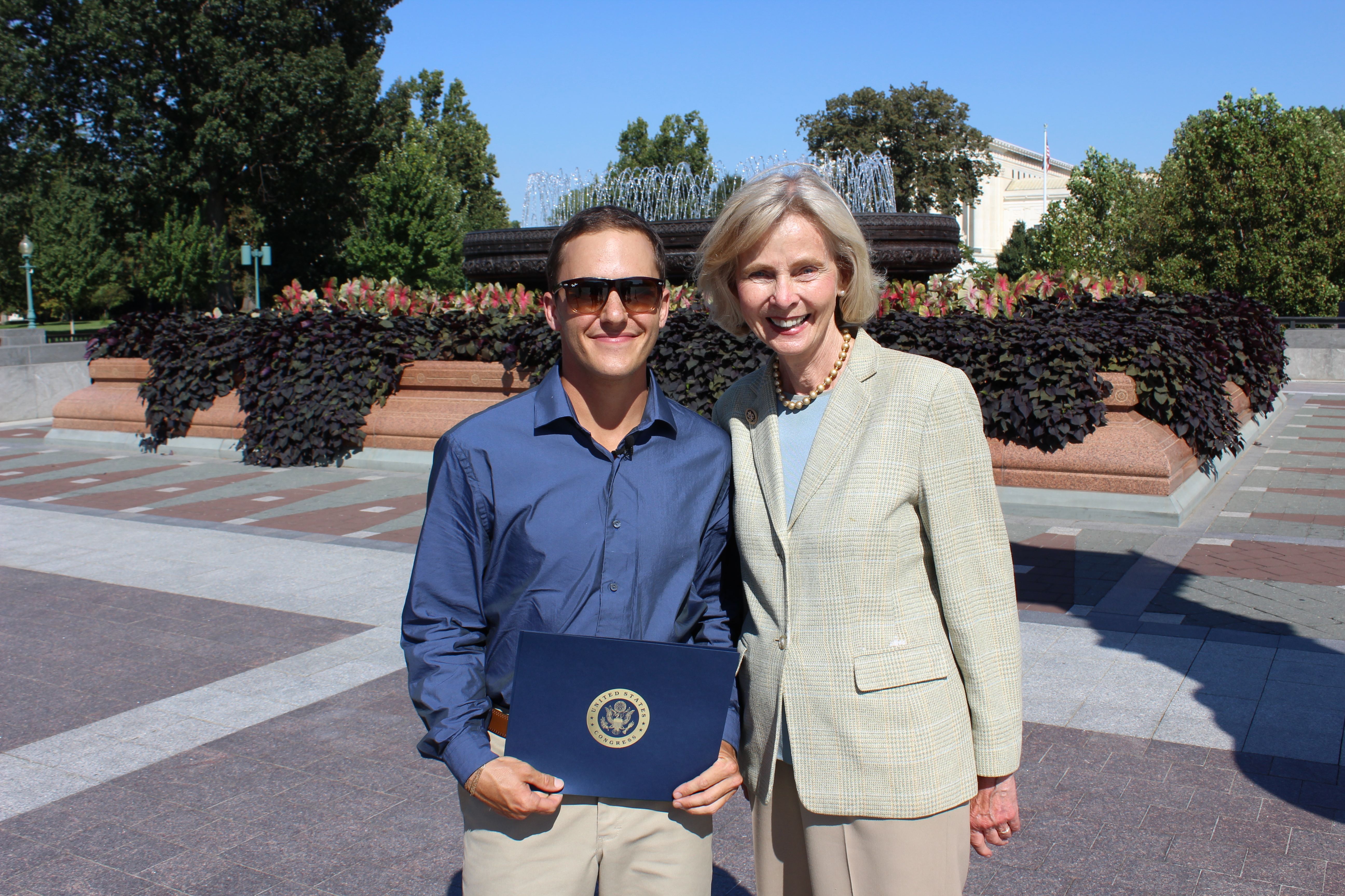 Taylor Lancaster receives a Congressional Award for his trek from Congress member Lois Capps