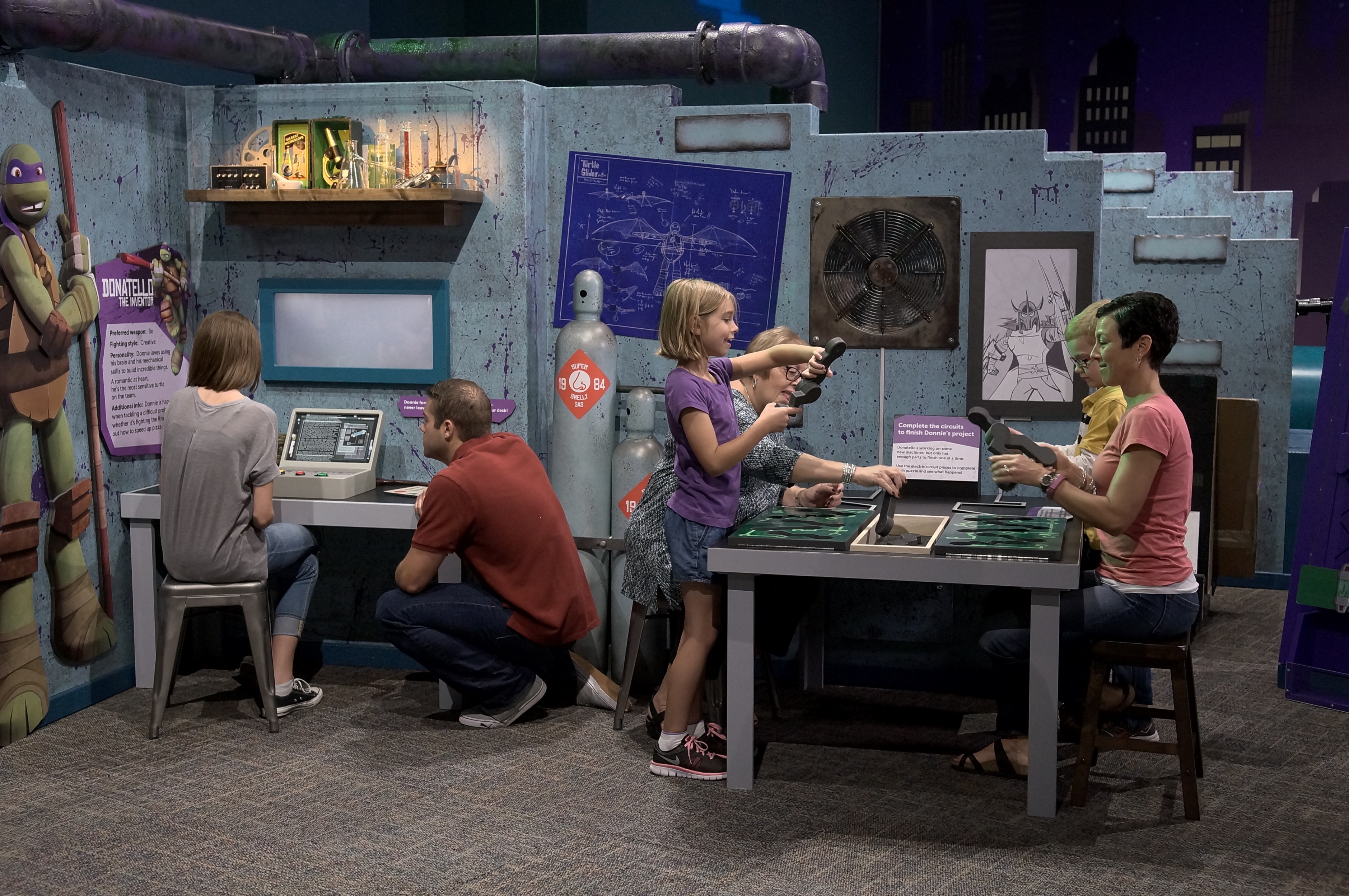 What are the secrets of the sewer? Find out with the Teenage Mutant Ninja Turtles in their first-ever museum exhibit.