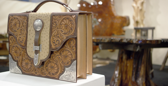 A tooled leather and silver bag by Matt Litz Silversmith was one of many functional art-to-wear pieces at the WDC Exhibit + Sale.