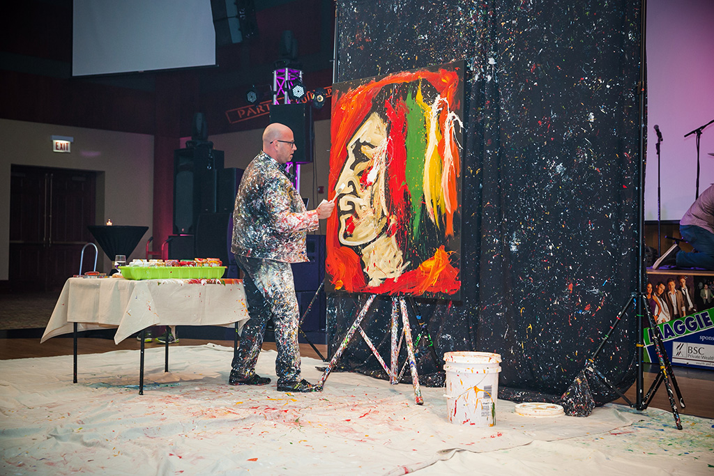 Artist Elliott From's Chicago Blackhawks painting was auctioned off at the party.