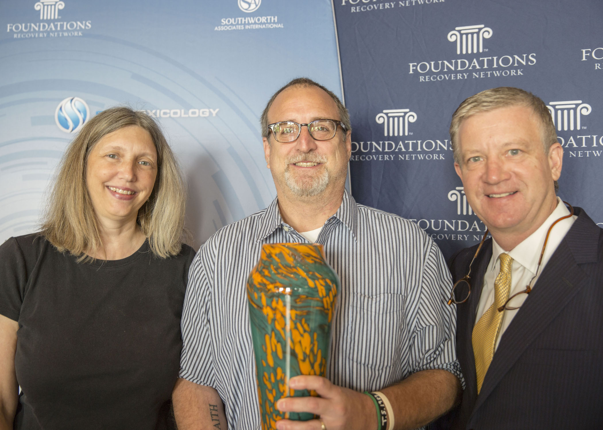 L-R Kathy Dauphinais, Rob Waggener, CEO Foundations Recovery Network and Dean Dauphinais