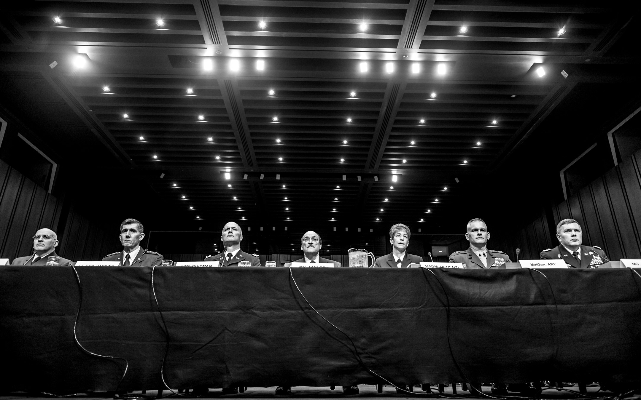 Military lawyers from the US Air Force, Army, Navy, Marines, and Coast Guard are grilled by lawmakers during a Senate Armed Services Committee hearing to discuss sexual assaults in the US Armed Forces