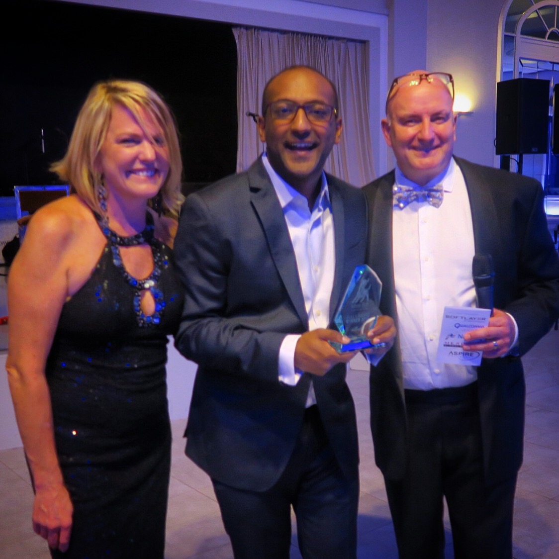 Skillbridge CTO & Co-Founder, Saalim Chowdhury with the Bully Award and White Bull Summit Chairs Elizabeth Perry and Farley Duvall