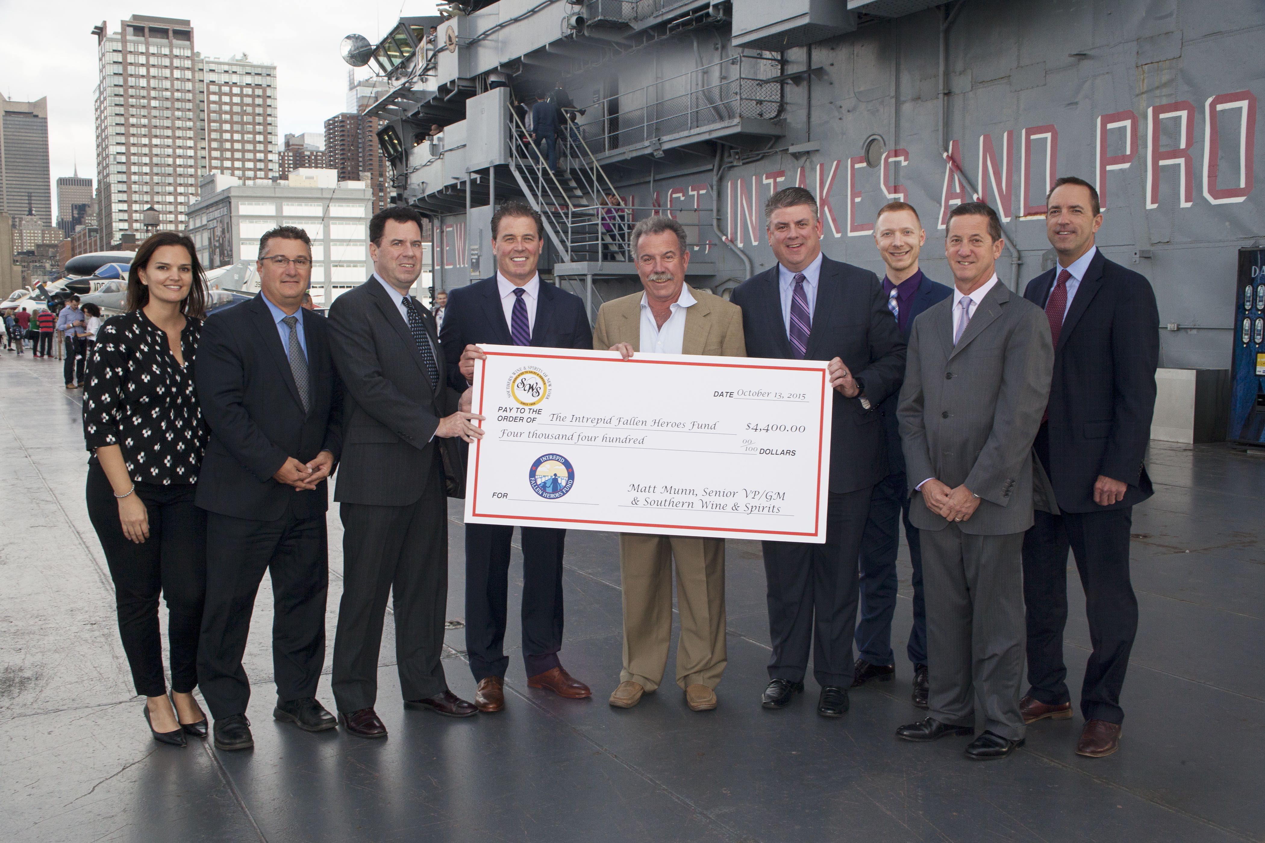 Southern Wine & Spirits of New York presents their donation to Intrepid Fallen Heroes Fund President, David Winters and Vice President, Lisa Yaconiello.