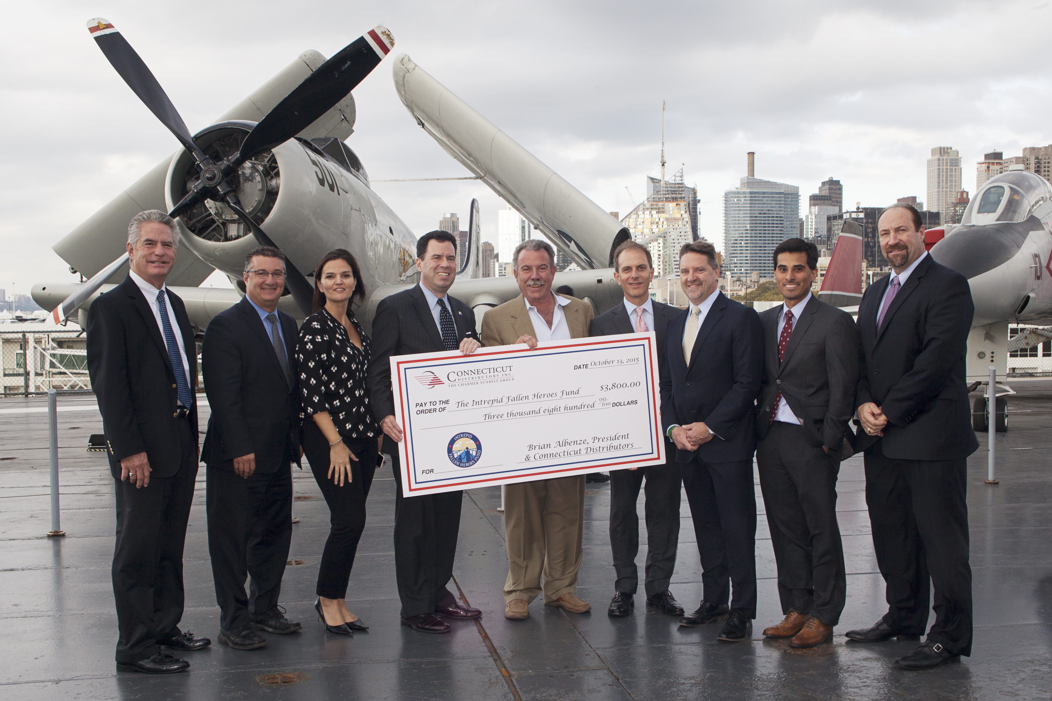 Connecticut Distributors Inc. presents their donation to Intrepid Fallen Heroes Fund President, David Winters and Vice President, Lisa Yaconiello.