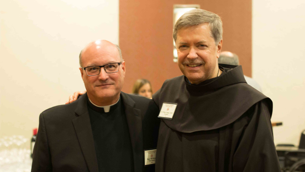 Very Msgr. Bill Stumpf, PhD (L) and Fr. Peter Vasko, OFM