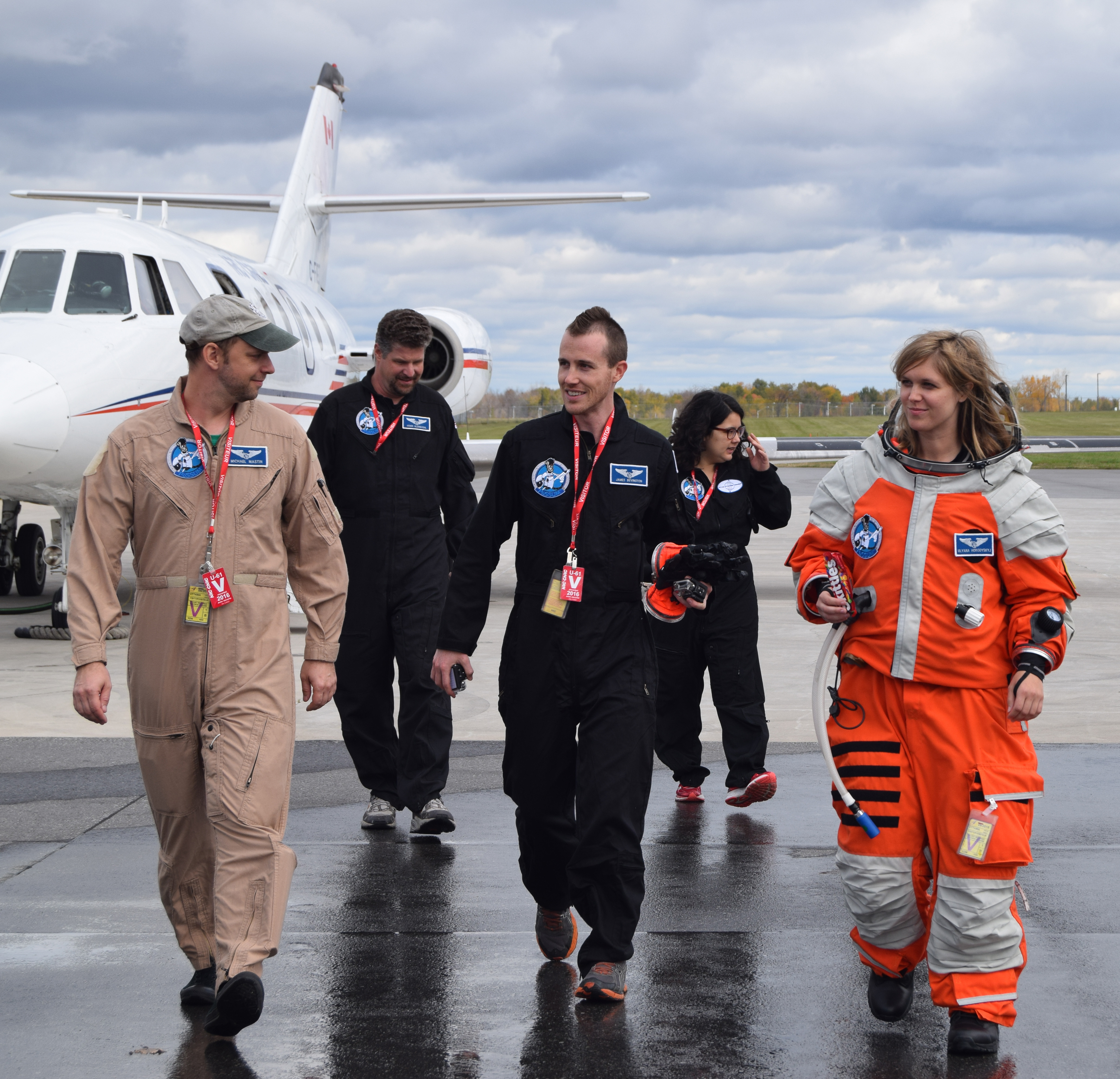 (L-R) Project PoSSUM flight research team Michael Mastin, Armin Kleinboehl, James Bevington, Kari Love, and Ulyana Horodyskyj complete successful spacesuit evaluation in zero-g. (Project PoSSUM PR)