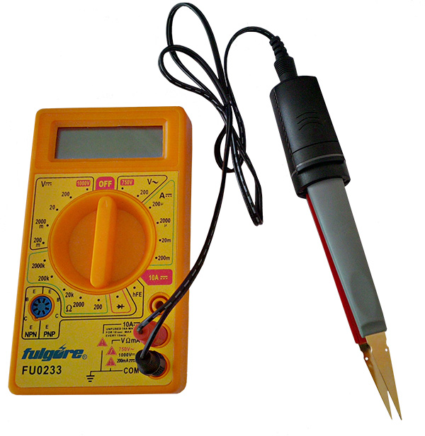 Smart LED Test Tweezers connected to a multimeter