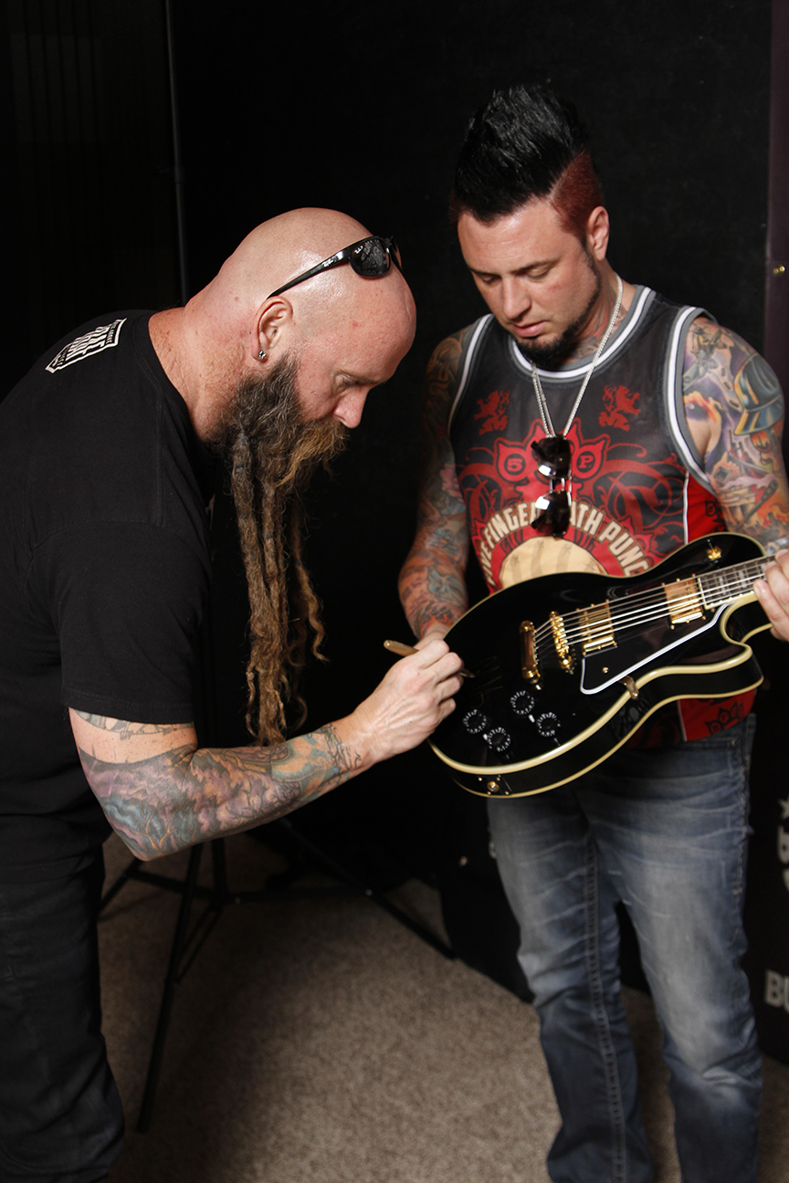 One lucky fan will win this Epiphone guitar signed by Five Finger Death Punch.
