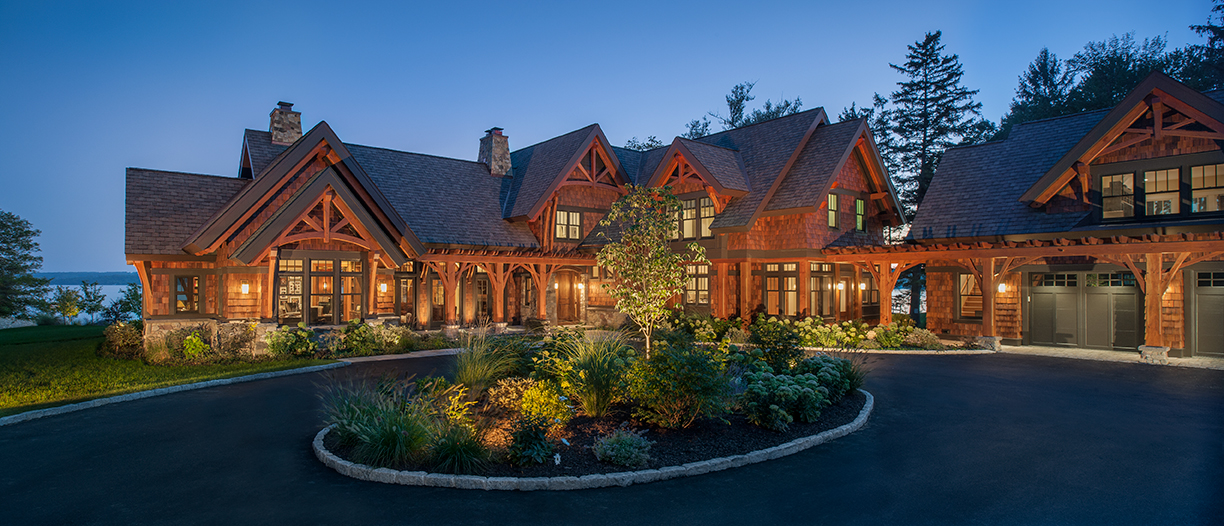 This expansive timber frame home overlooks one of the Finger Lakes in Upstate NY. Photo by Don Cochran Photography.