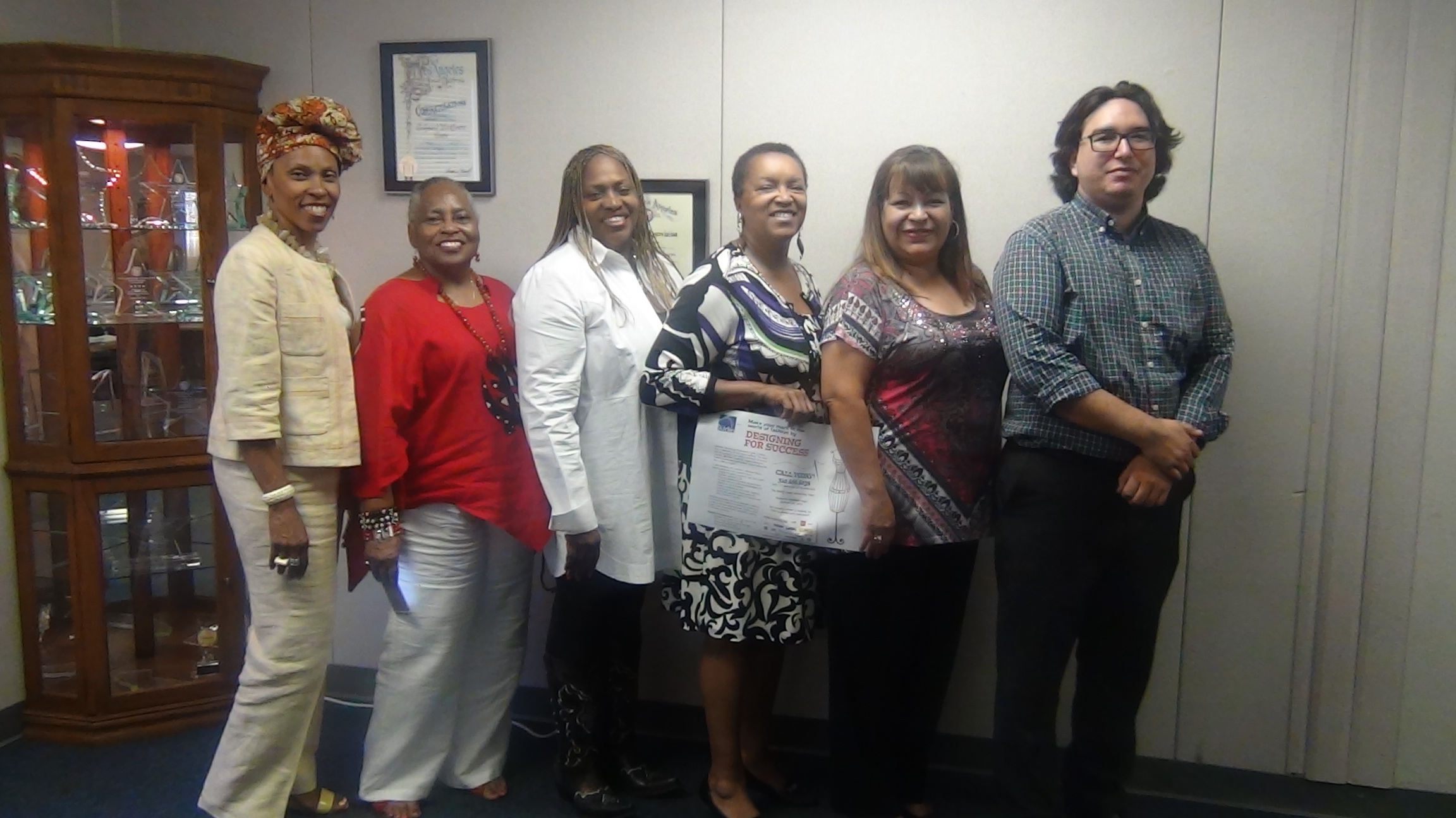 Clotee McAfee, founder of STITCHES TECHNOLOGY, Los Angeles, CA. (center) poses with the WorkForce Center instructors.