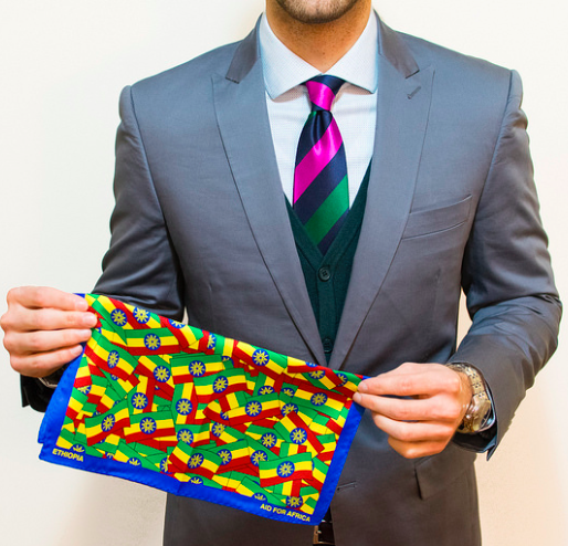 An Ethiopian Flag pocket square raising $24,000 for Sub-Sahran Africa