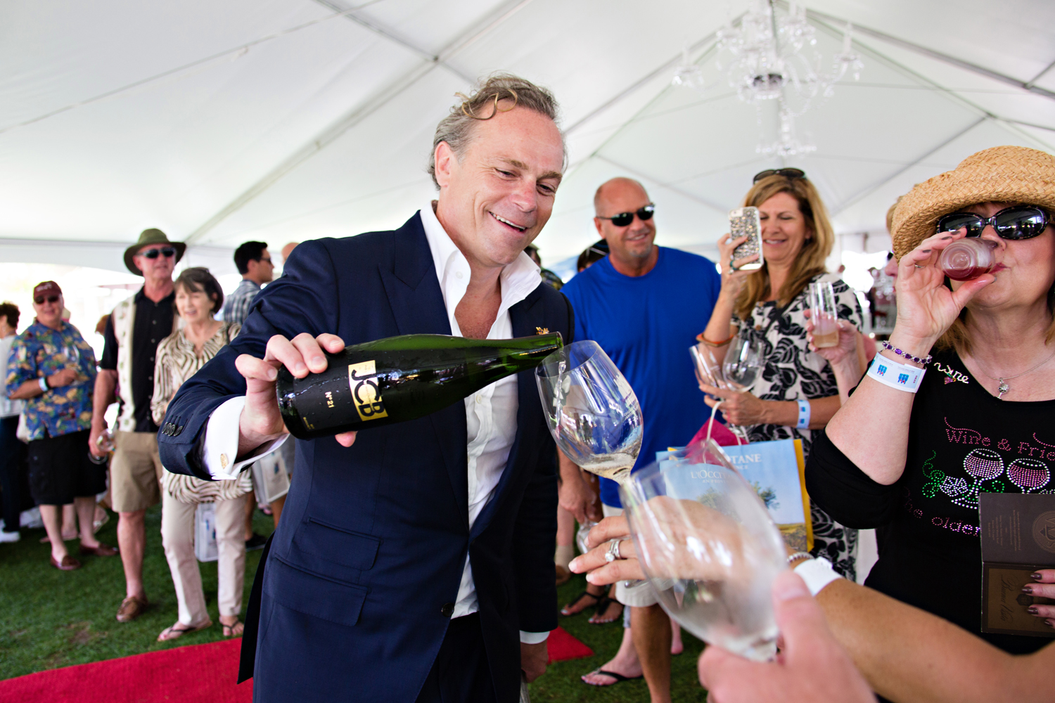 Celebrity winemaker Jean-Charles Boisset wows the crowd as he pours his signature wines and Champagnes at the 2015 South Walton Beaches Wine & Food Festival.