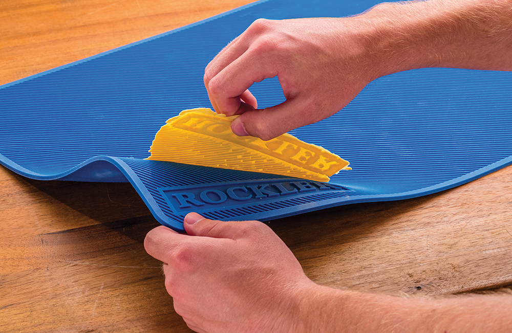The Silicone Project Mat sheds dried glue simply by cracking it and peeling it off.