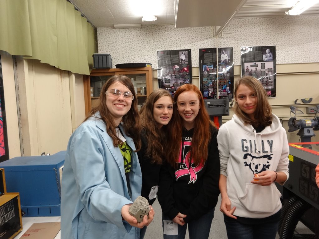 High school girls in Sierra College Engineering lab where they crushed a cement core sample