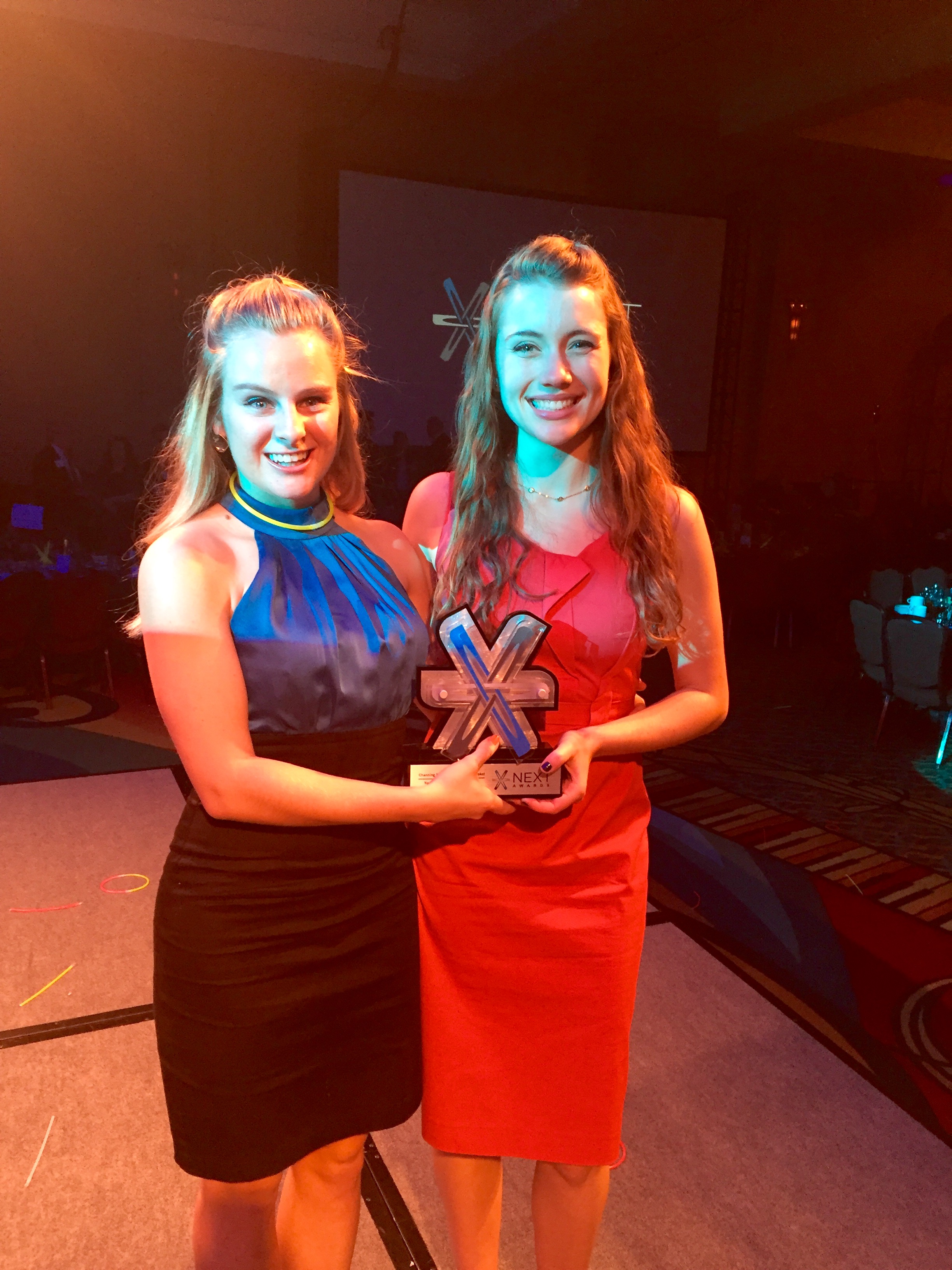 EVAmore Co-Founders Makenzie Stokel and Channing Moreland with their 2015 NEXT award trophy