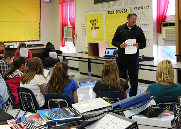 Joe Poehlmann, Technical Trainer at Balluff, with students at Scott County Middle School.