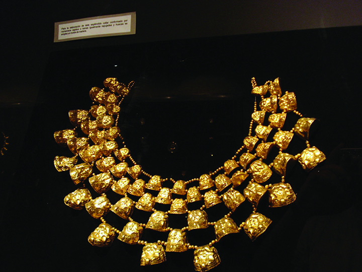 Gold necklace in Peru by Miguel Vera Leon