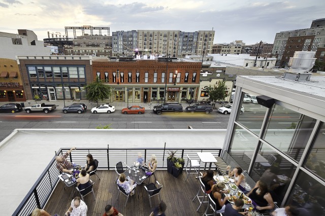A rooftop patio overlooking LoDo’s vibrant Ball Park district is a key feature of Arch11’s renovation of a historic pawn shop into a modern urban gastro pub for Ignite!  (Photo: courtesy of Arch11)