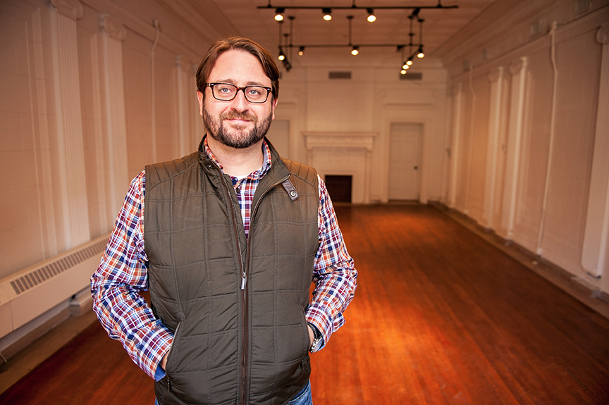 Christopher S. Aker, Linode CEO, stands inside the executive boardroom of the former Corn Exchange Bank which he recently purchased in Philadelphia.