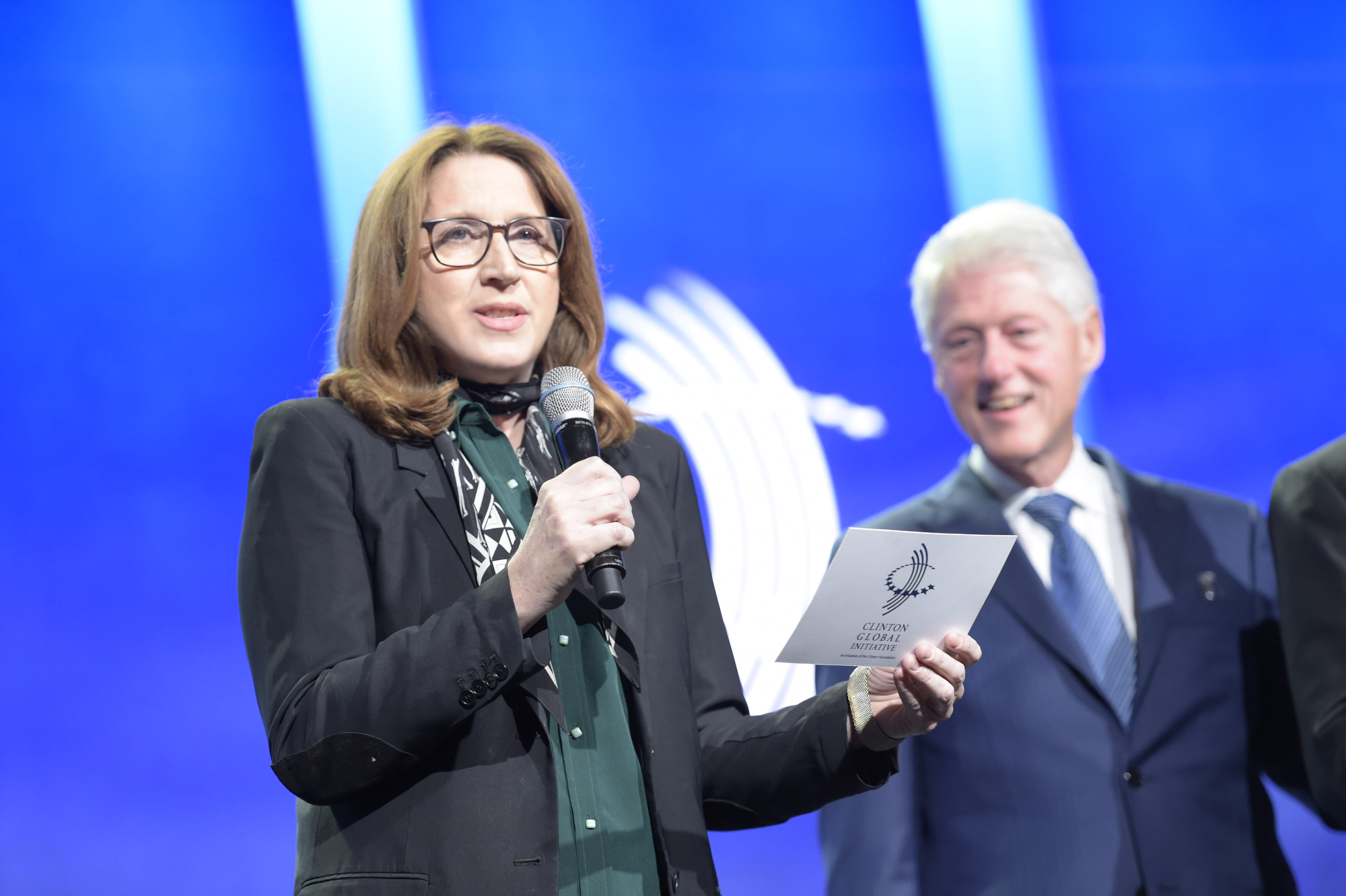 Catapult founder Maz Kessler with President Bill Clinton on stage at the Clinton Global Initiative 2015 Annual Meeting