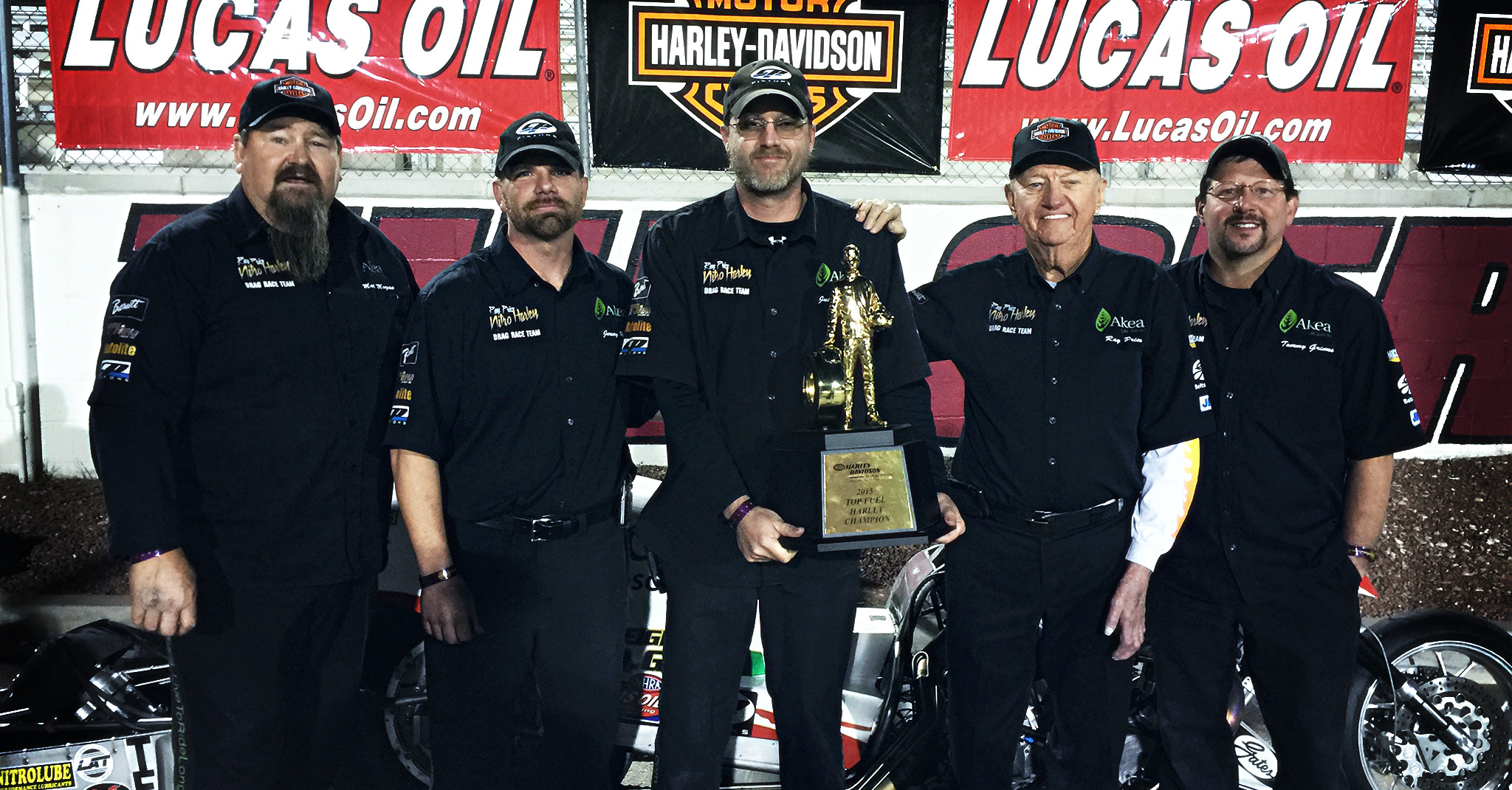Ray Price Motorsports Racing won back-to-back NHRA championships (L to R): manager Mark Morgan,crew chief Jeremy Hoy, engine builder Justin Heinle, owner Ray Price (deceased), racer Tommy Grimes.