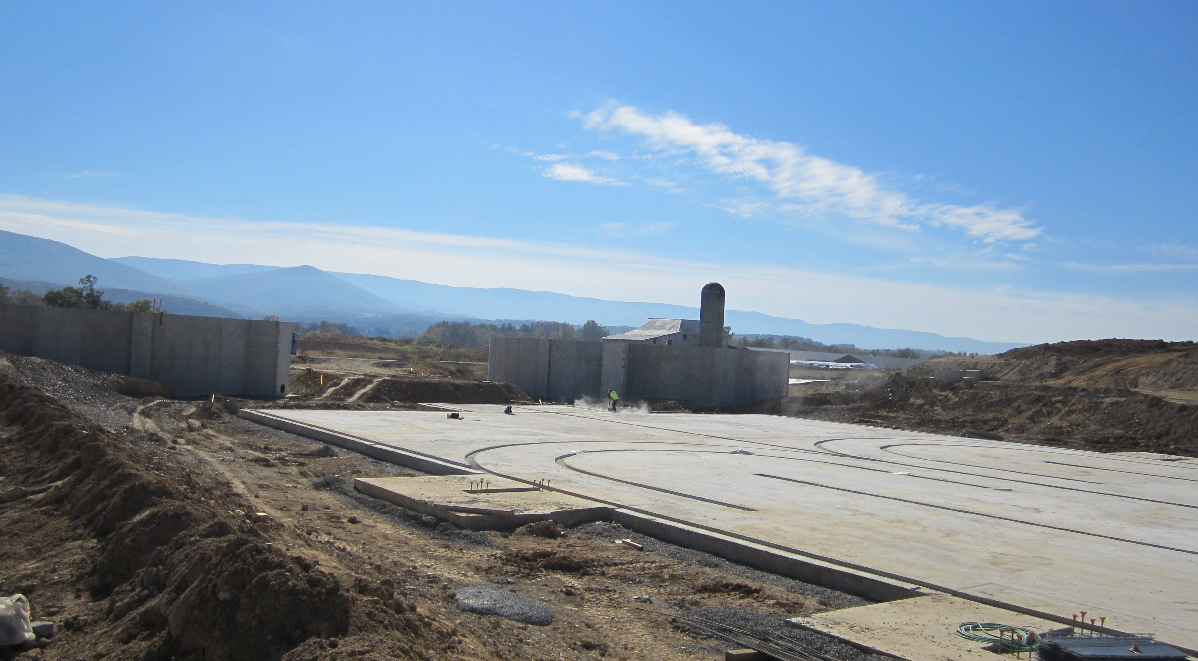 Cleaning up the Potomac: Looking at the newly-poured foundation slab of the Moorefield plant in West Virginia gives an idea of the massive dimensions of the new treatment plant now operational.