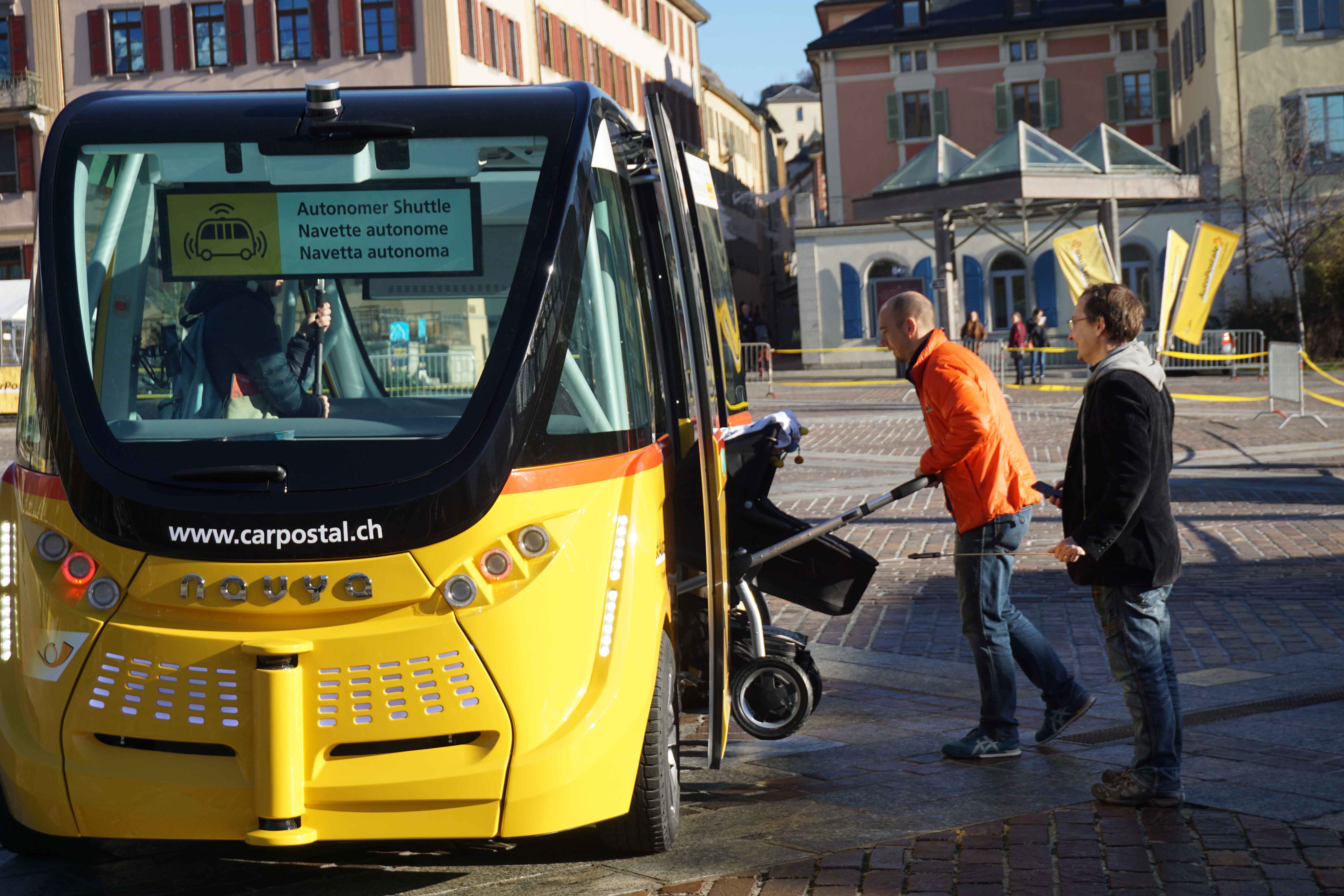 In Sion, Switzerland, passengers embark on the ARMA shuttle