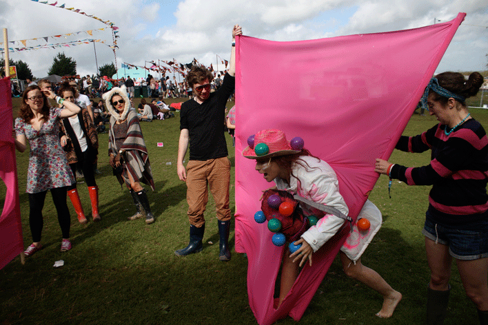 Contestant Takes on Vaccine Assault Course at Bestival Music Festival