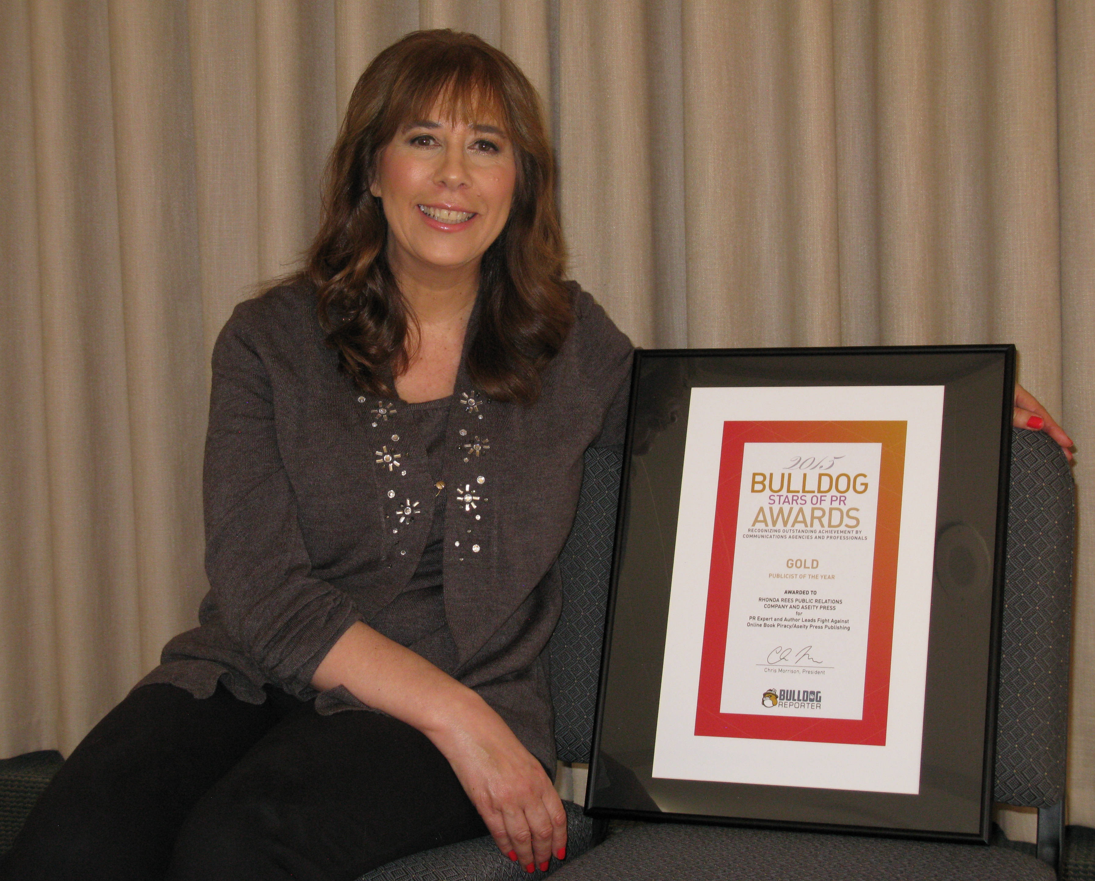 Rhonda Rees With Bulldog Reporter Award