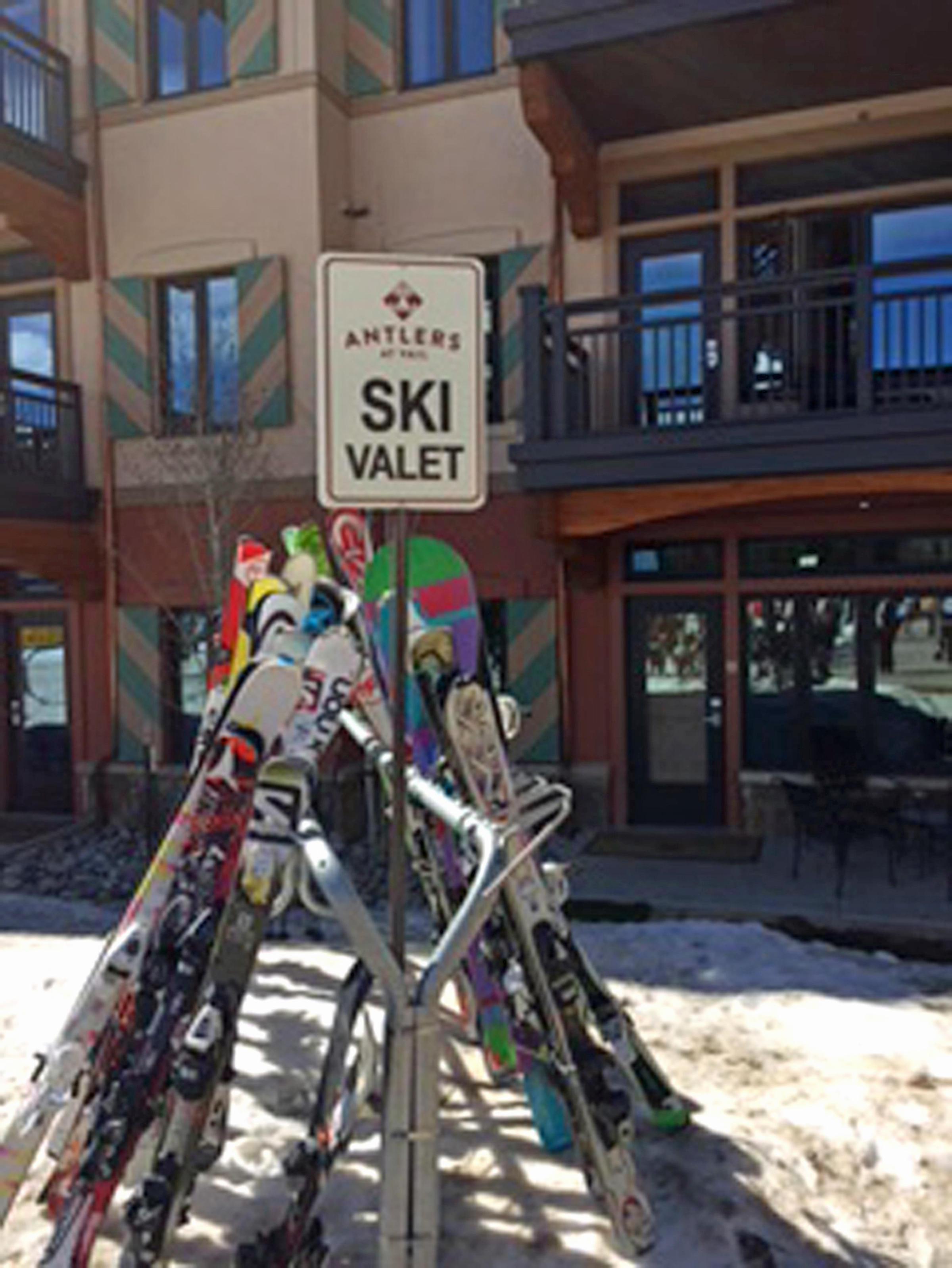 A designated rack at the base of the Lionshead gondola allows Antlers at Vail guests to pick up and deposit skis and snowboards with ease.