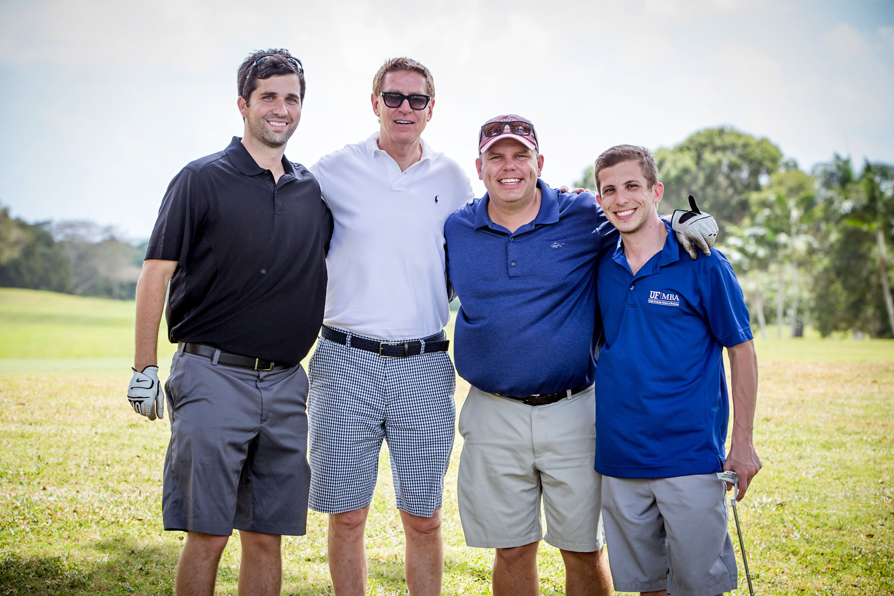 Kirk Chewning (second from right), co-CEO of Cane Bay Partners VI and vice chair of the Junior Achievement VI board, poses with teammates during the Junior Achievement Golf Classic Friday at Carambola